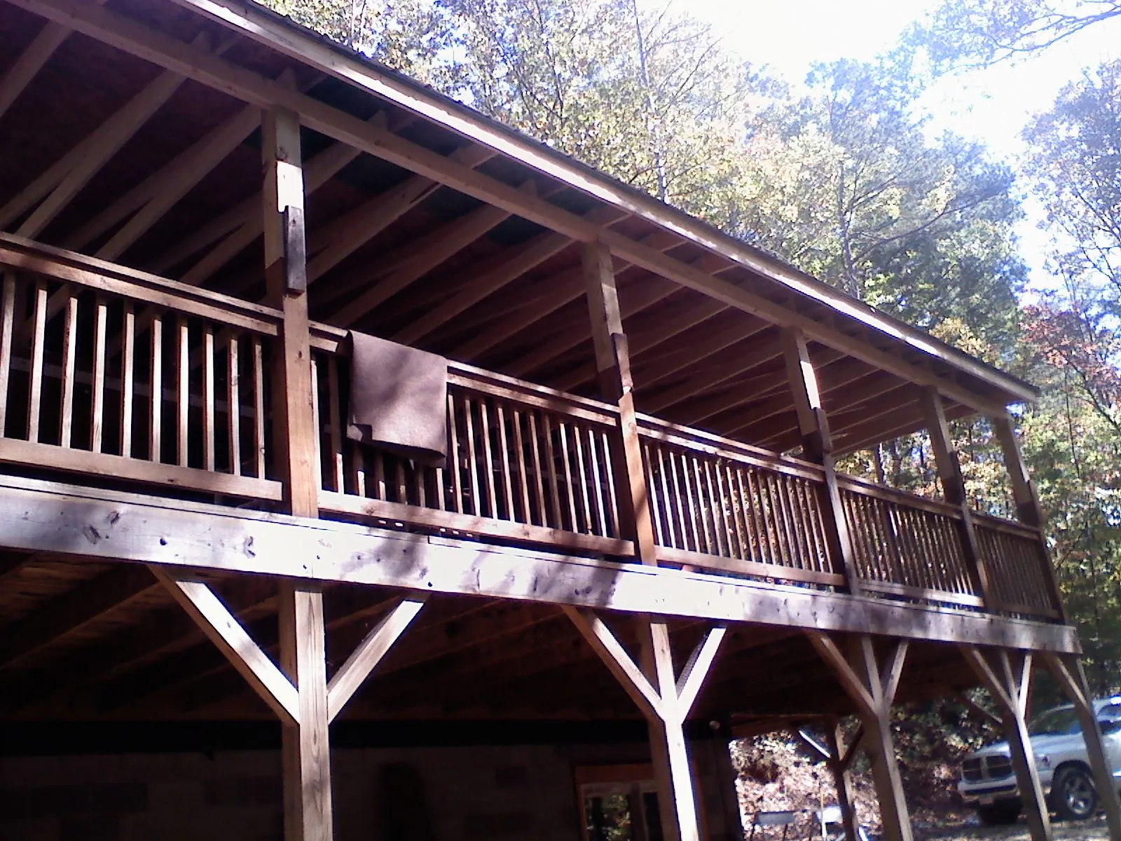 Timber framing under a new elevated porch and deck — Roof Leak Repair in Ossian by Roofing Brothers